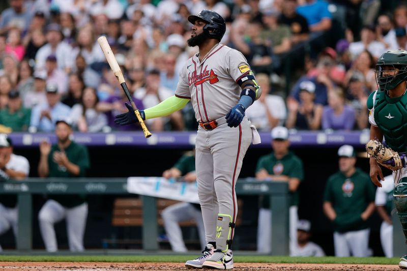 Aug 10, 2024; Denver, Colorado, USA; Atlanta Braves designated hitter Marcell Ozuna (20) reacts after striking out in the third inning against the Colorado Rockies at Coors Field. Mandatory Credit: Isaiah J. Downing-USA TODAY Sports