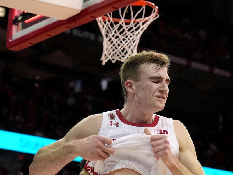 Feb. 18, 2023; Madison, WI, USA; Wisconsin Badgers forward Tyler Wahl (5) reacts after missing a game-winning basket at the buzzer in the second half against the Rutgers Scarlett Knights at the Kohl Center in Madison, Wis. Rutgers beat Wisconsin 58-57. Mandatory Credit: Mark Hoffman-USA TODAY Sports