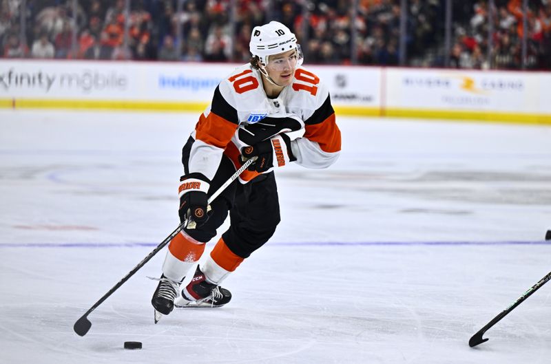 Apr 13, 2024; Philadelphia, Pennsylvania, USA; Philadelphia Flyers right wing Bobby Brink (10) controls the puck against the New Jersey Devils in the third period at Wells Fargo Center. Mandatory Credit: Kyle Ross-USA TODAY Sports