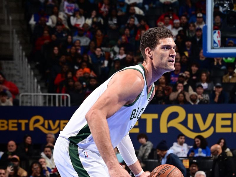 DETROIT, MI - DECEMBER 3: Brook Lopez #11 of the Milwaukee Bucks dribbles the ball during the game against the Detroit Pistons during the Emirates NBA Cup game on December 3, 2024 at Little Caesars Arena in Detroit, Michigan. NOTE TO USER: User expressly acknowledges and agrees that, by downloading and/or using this photograph, User is consenting to the terms and conditions of the Getty Images License Agreement. Mandatory Copyright Notice: Copyright 2024 NBAE (Photo by Chris Schwegler/NBAE via Getty Images)