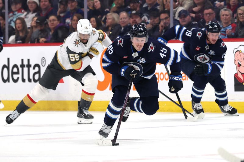 Mar 24, 2026; Winnipeg, Manitoba, CAN; Winnipeg Jets left wing Cole Koepke (45) skates past Vegas Golden Knights right wing Keegan Kolesar (55) in the second period at Canada Life Centre. Mandatory Credit: James Carey Lauder-Imagn Images