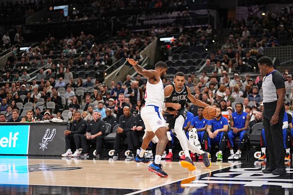 SAN ANTONIO, TX - NOVEMBER 22: Victor Wembanyama #1 of the San Antonio Spurs dribbles the ball during the game against the LA Clippers on November 22, 2023 at the Frost Bank Center in San Antonio, Texas. NOTE TO USER: User expressly acknowledges and agrees that, by downloading and or using this photograph, user is consenting to the terms and conditions of the Getty Images License Agreement. Mandatory Copyright Notice: Copyright 2023 NBAE (Photos by Darren Carroll/NBAE via Getty Images)