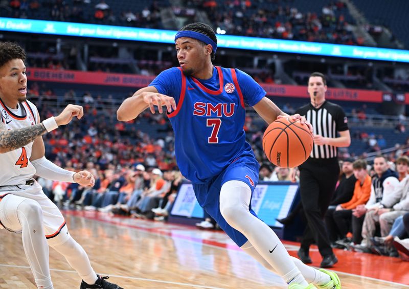 Feb 14, 2026; Syracuse, New York, USA; Southern Methodist University Mustangs forward Jermaine O'Neal Jr. (7) drives the baseline with Syracuse Orange guard Nate Kingz (4) defending in the first half at the JMA Wireless Dome. Mandatory Credit: Mark Konezny-Imagn Images