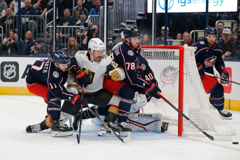 Mar 4, 2024; Columbus, Ohio, USA; Columbus Blue Jackets defenseman Damon Severson (78) clears a loose puck  against the Vegas Golden Knights during the first period at Nationwide Arena. Mandatory Credit: Russell LaBounty-USA TODAY Sports