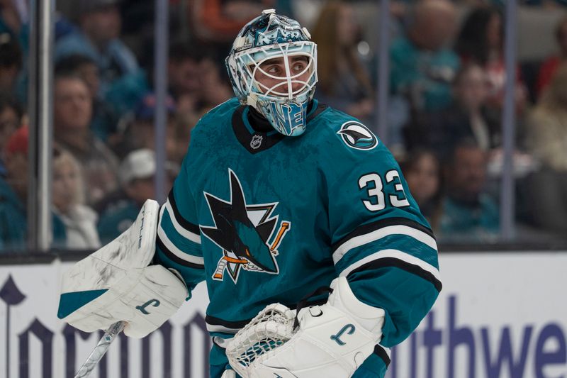 Jan 23, 2026; San Jose, California, USA;  San Jose Sharks goaltender Alex Nedeljkovic (33) during the first period against the New York Rangers at SAP Center at San Jose. Mandatory Credit: Stan Szeto-Imagn Images