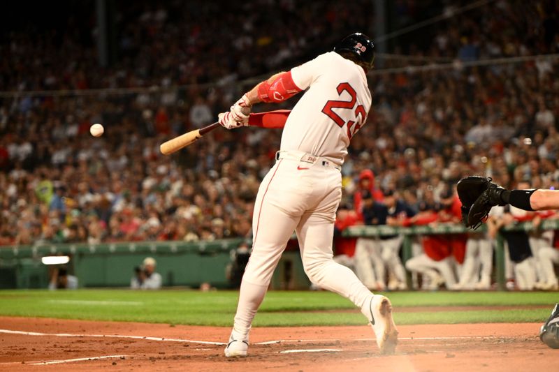 Sep 14, 2025; Boston, Massachusetts, USA;  Boston Red Sox first baseman Romy Gonzalez (23) hits a RBI single against the New York Yankees during the first inning at Fenway Park. Mandatory Credit: Brian Fluharty-Imagn Images