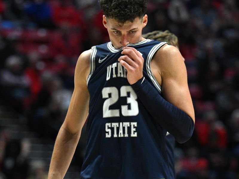 Jan 25, 2023; San Diego, California, USA; Utah State Aggies forward Taylor Funk (23) reacts during the first half against the San Diego State Aztecs at Viejas Arena. Mandatory Credit: Orlando Ramirez-USA TODAY Sports