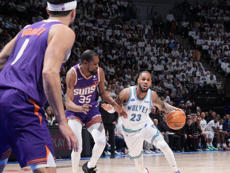 MINNEAPOLIS, MN -  APRIL 20: Monte Morris #23 of the Minnesota Timberwolves drives to the basket during Round One Game One of the 2024 NBA Playoffs against the Phoenix Suns on April 20, 2024 at Target Center in Minneapolis, Minnesota. NOTE TO USER: User expressly acknowledges and agrees that, by downloading and or using this Photograph, user is consenting to the terms and conditions of the Getty Images License Agreement. Mandatory Copyright Notice: Copyright 2024 NBAE (Photo by Jordan Johnson/NBAE via Getty Images)