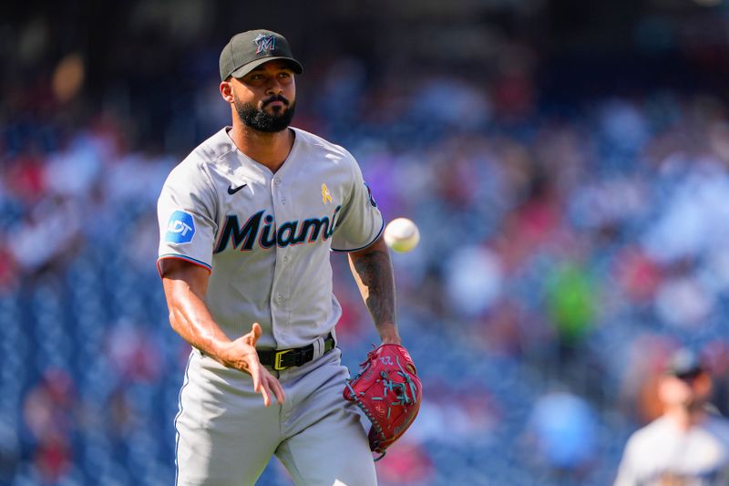 Sep 3, 2023; Washington, District of Columbia, USA;  Miami Marlins pitcher Sandy Alcantara (22) tosses to first base to record an out against the Washington Nationals during the sixth inning at Nationals Park. Mandatory Credit: Gregory Fisher-USA TODAY Sports