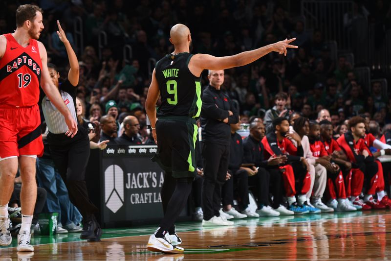 BOSTON, MA - NOVEMBER 16: Derrick White #9 of the Boston Celtics celebrates during the game against the Toronto Raptors on November 16, 2024 at TD Garden in Boston, Massachusetts. NOTE TO USER: User expressly acknowledges and agrees that, by downloading and/or using this Photograph, user is consenting to the terms and conditions of the Getty Images License Agreement. Mandatory Copyright Notice: Copyright 2024 NBAE (Photo by Brian Babineau/NBAE via Getty Images)