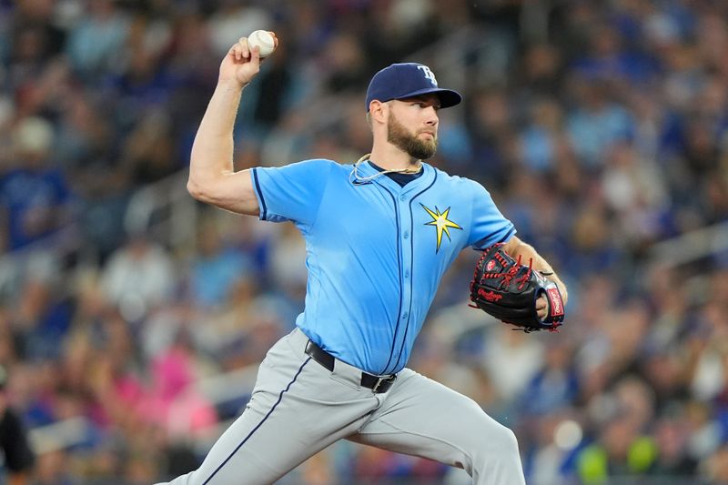 Sep 26, 2025; Toronto, Ontario, CAN; Tampa Bay Rays starting pitcher Adrian Houser (37) pitches to the Toronto Blue Jays during the first inning at Rogers Centre. Mandatory Credit: John E. Sokolowski-Imagn Images