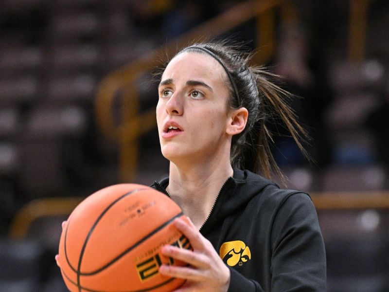 Feb 15, 2024; Iowa City, Iowa, USA; Iowa Hawkeyes guard Caitlin Clark (22) warms up before the game against the Michigan Wolverines at Carver-Hawkeye Arena. Mandatory Credit: Jeffrey Becker-USA TODAY Sports