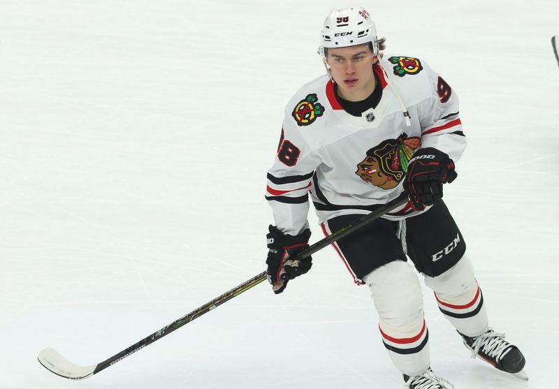 Apr 8, 2025; Pittsburgh, Pennsylvania, USA;  Chicago Blackhawks center Connor Bedard (98) warms up before the game against the Pittsburgh Penguins at PPG Paints Arena. Mandatory Credit: Charles LeClaire-Imagn Images