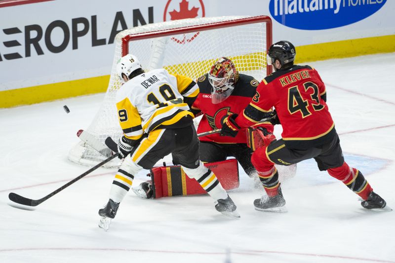 Mar 26, 2026; Ottawa, Ontario, CAN; Ottawa Senators goalie Linus Ullmark (35) makes a save on a shot from Pittsburgh Penguins center Connor Dewar (19) in the third period at the Canadian Tire Centre. Mandatory Credit: Marc DesRosiers-IMAGN Images