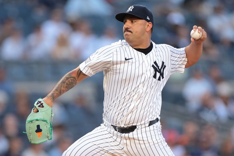 Jun 18, 2024; Bronx, New York, USA; New York Yankees starting pitcher Nestor Cortes (65) delivers a pitch during the first inning against the Baltimore Orioles at Yankee Stadium. Mandatory Credit: Vincent Carchietta-USA TODAY Sports