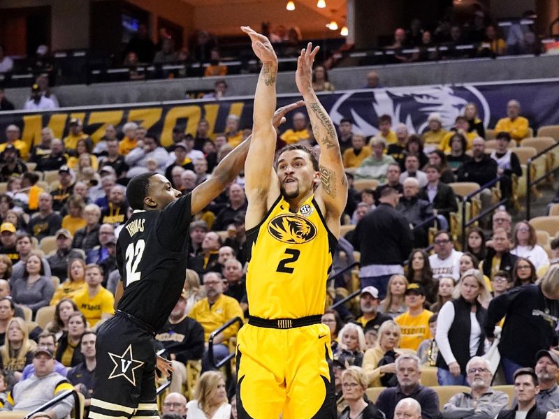 Jan 7, 2023; Columbia, Missouri, USA; Vanderbilt Commodores guard Noah Shelby (2) shoots as Vanderbilt Commodores guard Graham Calton (22) defends during the first half at Mizzou Arena. Mandatory Credit: Denny Medley-USA TODAY Sports