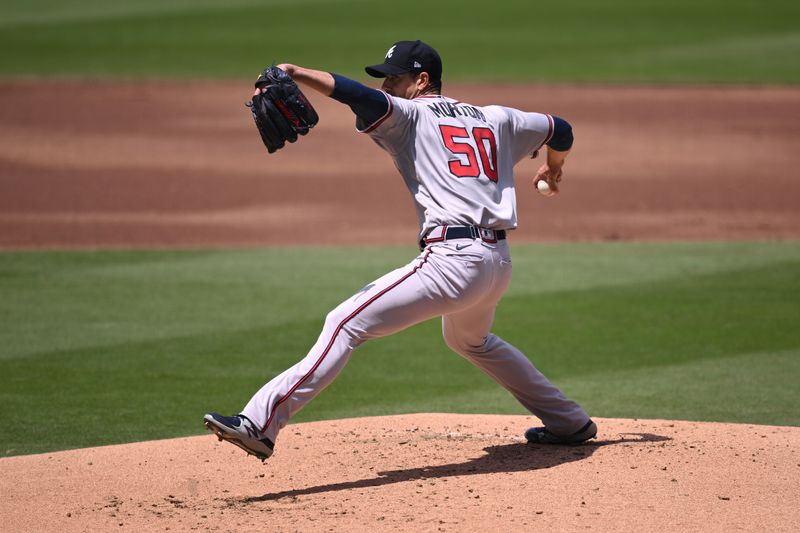 Apr 19, 2023; San Diego, California, USA; Atlanta Braves starting pitcher Charlie Morton (50) throws a pitch against the San Diego Padres during the first inning at Petco Park. Mandatory Credit: Orlando Ramirez-USA TODAY Sports