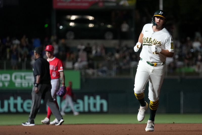 May 21, 2025; West Sacramento, California, USA; Athletics first baseman Nick Kurtz (16) jogs toward third base after hitting a home run against the Los Angeles Angels in the fifth inning at Sutter Health Park. Mandatory Credit: Cary Edmondson-Imagn Images