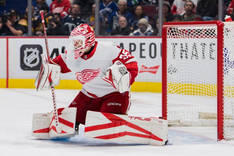 Feb 13, 2023; Vancouver, British Columbia, CAN; Detroit Red Wings goalie Ville Husso (35) makes a save against the Vancouver Canucks in the third period at Rogers Arena. Red Wings won 6-1. Mandatory Credit: Bob Frid-USA TODAY Sports