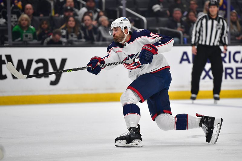 Mar 16, 2023; Los Angeles, California, USA; Columbus Blue Jackets defenseman Erik Gudbranson (44) shoots on goal against the Los Angeles Kings during the first period at Crypto.com Arena. Mandatory Credit: Gary A. Vasquez-USA TODAY Sports