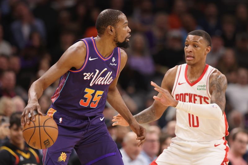 PHOENIX, ARIZONA - FEBRUARY 29: Kevin Durant #35 of the Phoenix Suns handles the ball against Jabari Smith Jr. #10 of the Houston Rockets during the second half of the NBA game at Footprint Center on February 29, 2024 in Phoenix, Arizona. NOTE TO USER: User expressly acknowledges and agrees that, by downloading and or using this photograph, User is consenting to the terms and conditions of the Getty Images License Agreement.  (Photo by Christian Petersen/Getty Images)