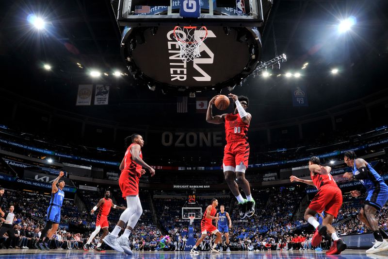 ORLANDO, FL - APRIL 1: Scoot Henderson #00 of the Portland Trail Blazers grabs a rebound during the game against the Orlando Magic on April 1, 2024 at Kia Center in Orlando, Florida. NOTE TO USER: User expressly acknowledges and agrees that, by downloading and or using this photograph, User is consenting to the terms and conditions of the Getty Images License Agreement. Mandatory Copyright Notice: Copyright 2024 NBAE (Photo by Fernando Medina/NBAE via Getty Images)