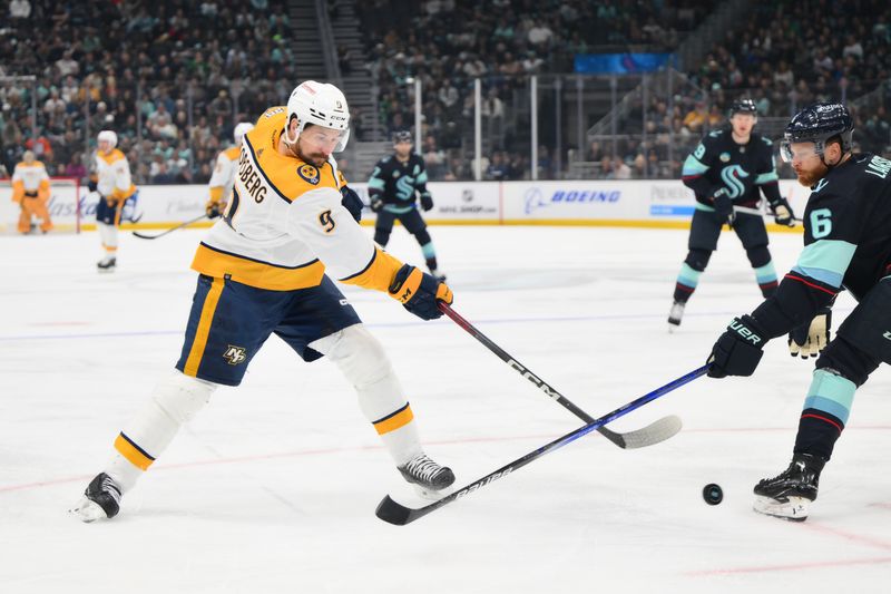 Mar 16, 2024; Seattle, Washington, USA; Nashville Predators left wing Filip Forsberg (9) passes the puck against the Seattle Kraken during the first period at Climate Pledge Arena. Mandatory Credit: Steven Bisig-USA TODAY Sports