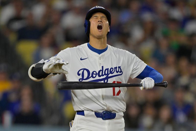 Jun 4, 2025; Los Angeles, California, USA;  Los Angeles Dodgers designated hitter Shohei Ohtani (17) reacts after called strike in the fifth inning against the New York Mets at Dodger Stadium. Mandatory Credit: Jayne Kamin-Oncea-Imagn Images