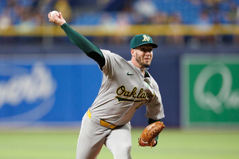 May 28, 2024; St. Petersburg, Florida, USA;  Oakland Athletics pitcher Mitch Spence (40) throws a pitch against the Tampa Bay Rays in the second inning at Tropicana Field. Mandatory Credit: Nathan Ray Seebeck-USA TODAY Sports