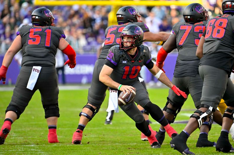 Nov 18, 2023; Fort Worth, Texas, USA; TCU Horned Frogs quarterback Josh Hoover (10) runs with the ball against the Baylor Bears during the first half at Amon G. Carter Stadium. Mandatory Credit: Jerome Miron-USA TODAY Sports