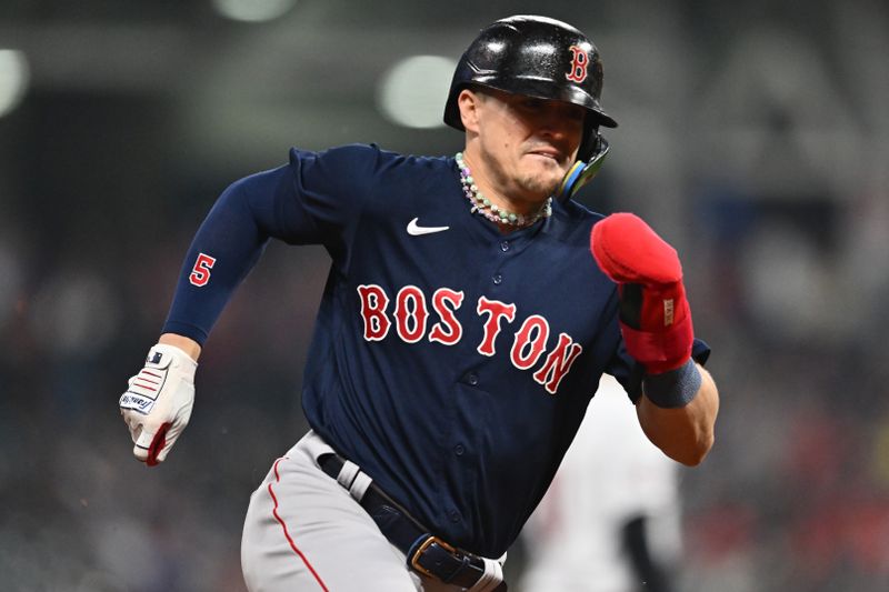 Jun 6, 2023; Cleveland, Ohio, USA; Boston Red Sox shortstop Enrique Hernandez (5) advances to third during the eighth inning against the Cleveland Guardians at Progressive Field. Mandatory Credit: Ken Blaze-USA TODAY Sports