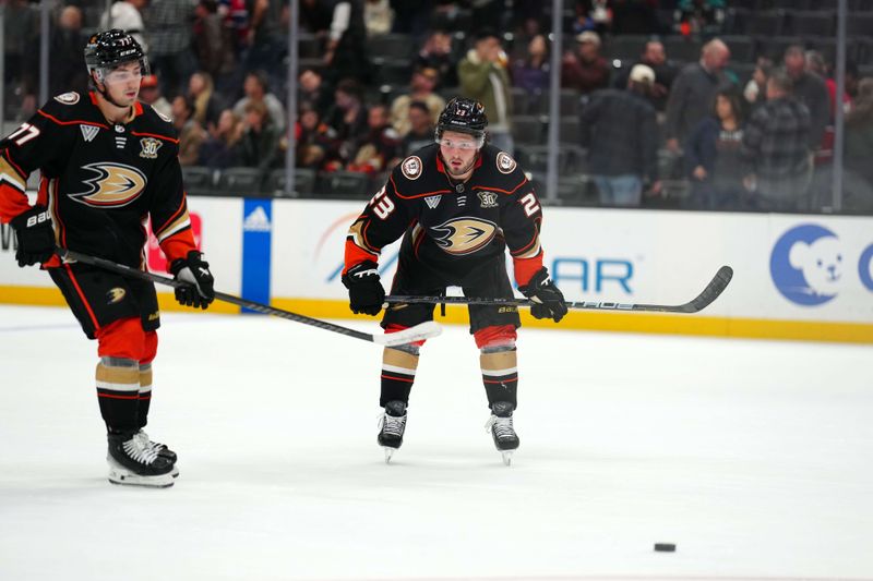 Nov 22, 2023; Anaheim, California, USA; Anaheim Ducks center Mason McTavish (23) and right wing Frank Vatrano (77) react at the end of the game against the Montreal Canadiens at Honda Center. Mandatory Credit: Kirby Lee-USA TODAY Sports