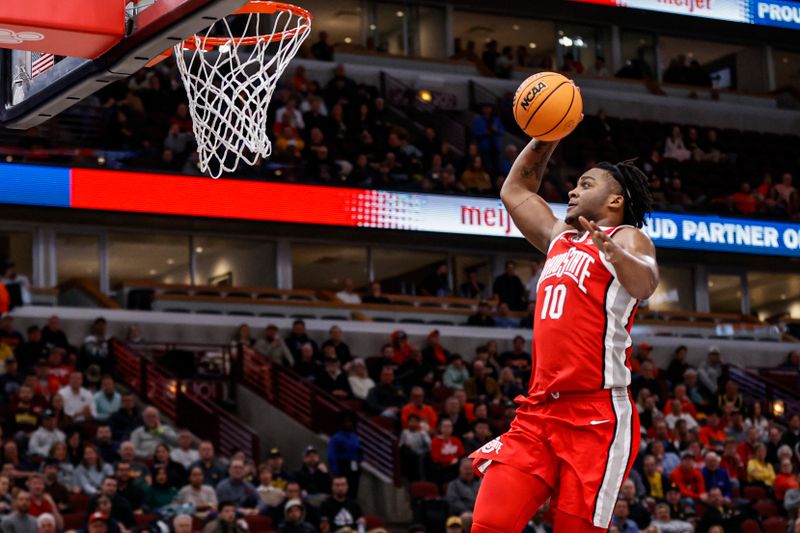 Mar 9, 2023; Chicago, IL, USA; Ohio State Buckeyes forward Brice Sensabaugh (10) drives to the basket against the Iowa Hawkeyes during the first half at United Center. Mandatory Credit: Kamil Krzaczynski-USA TODAY Sports