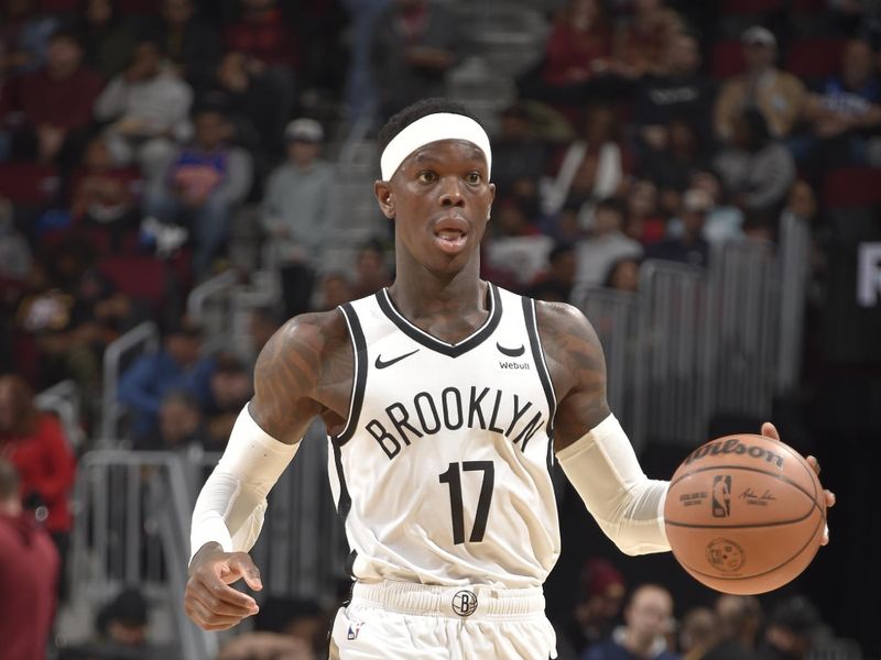 CLEVELAND, OH - MARCH 10: Dennis Schroder #17 of the Brooklyn Nets dribbles the ball during the game against the Cleveland Cavaliers on March 10, 2024 at Rocket Mortgage FieldHouse in Cleveland, Ohio. NOTE TO USER: User expressly acknowledges and agrees that, by downloading and/or using this Photograph, user is consenting to the terms and conditions of the Getty Images License Agreement. Mandatory Copyright Notice: Copyright 2024 NBAE (Photo by David Liam Kyle/NBAE via Getty Images)