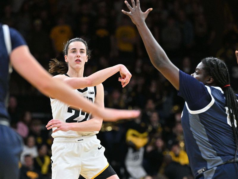 Feb 8, 2024; Iowa City, Iowa, USA; Iowa Hawkeyes guard Caitlin Clark (22) throws a pass against the Penn State Nittany Lions during the second half at Carver-Hawkeye Arena. Mandatory Credit: Jeffrey Becker-USA TODAY Sports