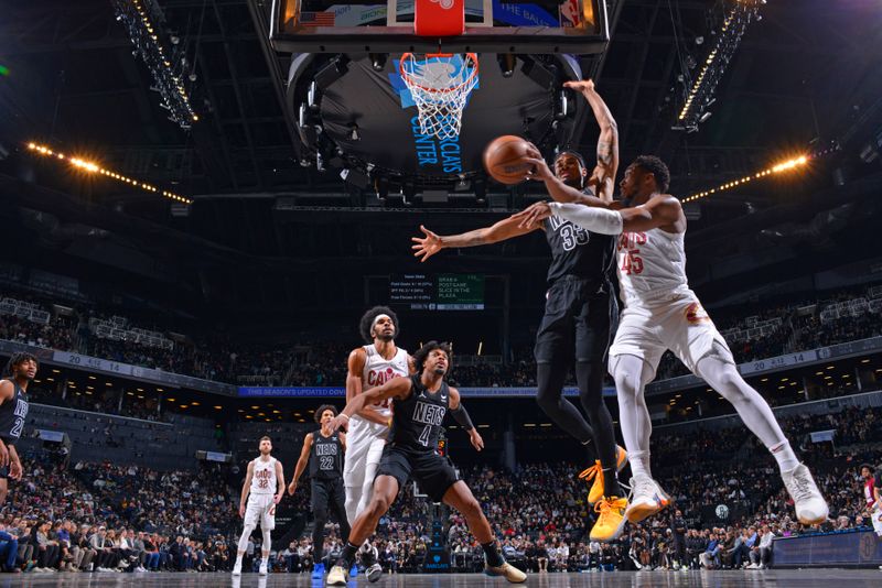 BROOKLYN, NY - FEBRUARY 8: Donovan Mitchell #45 of the Cleveland Cavaliers passes the ball during the game against the Brooklyn Nets on February 8, 2024 at Barclays Center in Brooklyn, New York. NOTE TO USER: User expressly acknowledges and agrees that, by downloading and or using this Photograph, user is consenting to the terms and conditions of the Getty Images License Agreement. Mandatory Copyright Notice: Copyright 2024 NBAE (Photo by Jesse D. Garrabrant/NBAE via Getty Images)