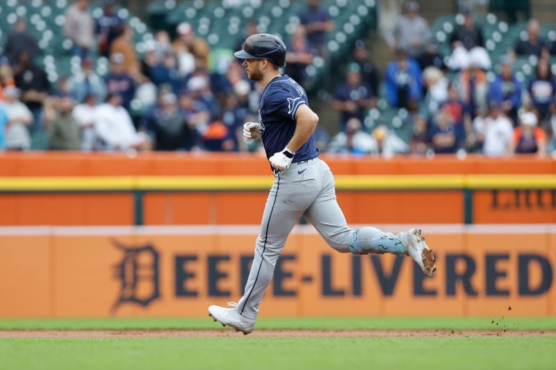 Sep 24, 2024; Detroit, Michigan, USA;  Tampa Bay Rays second baseman Brandon Lowe (8) runs the bases after he hits a home run in the ninth inning against the Detroit Tigers at Comerica Park. Mandatory Credit: Rick Osentoski-Imagn Images