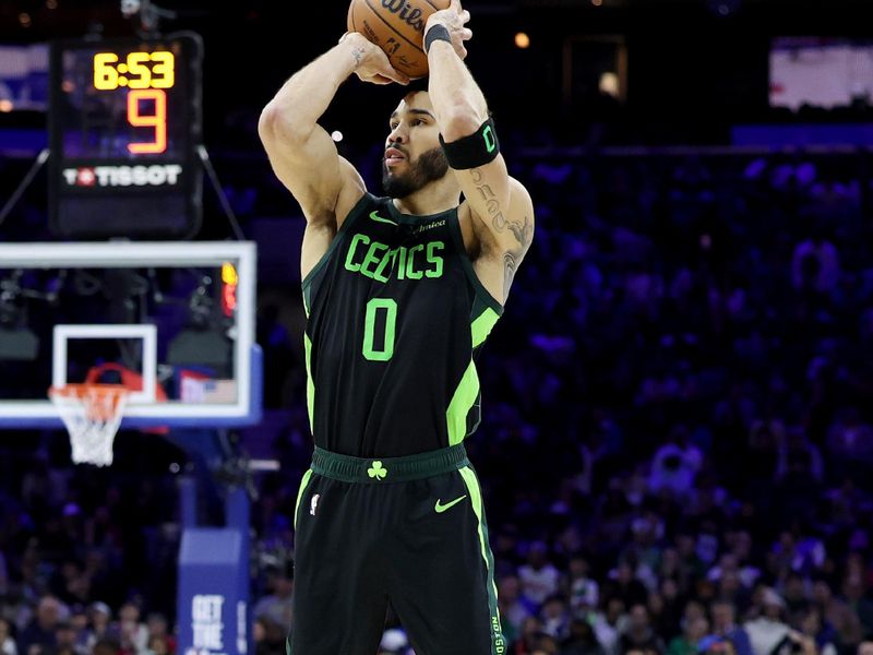 PHILADELPHIA, PENNSYLVANIA - FEBRUARY 02: Jayson Tatum #0 of the Boston Celtics shoots a three-pointer during a game against the Philadelphia 76ers at the Wells Fargo Center on February 02, 2025 in Philadelphia, Pennsylvania. NOTE TO USER: User expressly acknowledges and agrees that, by downloading and or using this photograph, User is consenting to the terms and conditions of the Getty Images License Agreement. (Photo by Emilee Chinn/Getty Images)