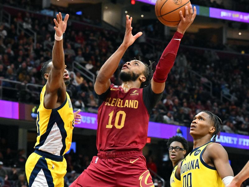 CLEVELAND, OHIO - APRIL 02: Darius Garland #10 of the Cleveland Cavaliers shoots over Aaron Nesmith #23 of the Indiana Pacers during the third quarter at Rocket Mortgage Fieldhouse on April 02, 2023 in Cleveland, Ohio. The Cavaliers defeated the Pacers 115-105. NOTE TO USER: User expressly acknowledges and agrees that, by downloading and or using this photograph, User is consenting to the terms and conditions of the Getty Images License Agreement. (Photo by Jason Miller/Getty Images)