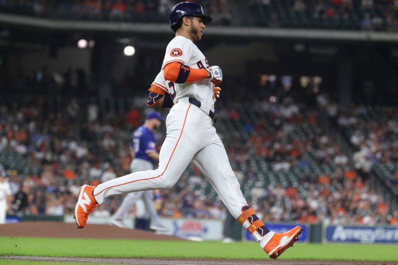 Sep 16, 2025; Houston, Texas, USA; Houston Astros shortstop Jeremy Pena (3) runs to first base on a single during the first inning against the Texas Rangers at Daikin Park. Mandatory Credit: Troy Taormina-Imagn Images