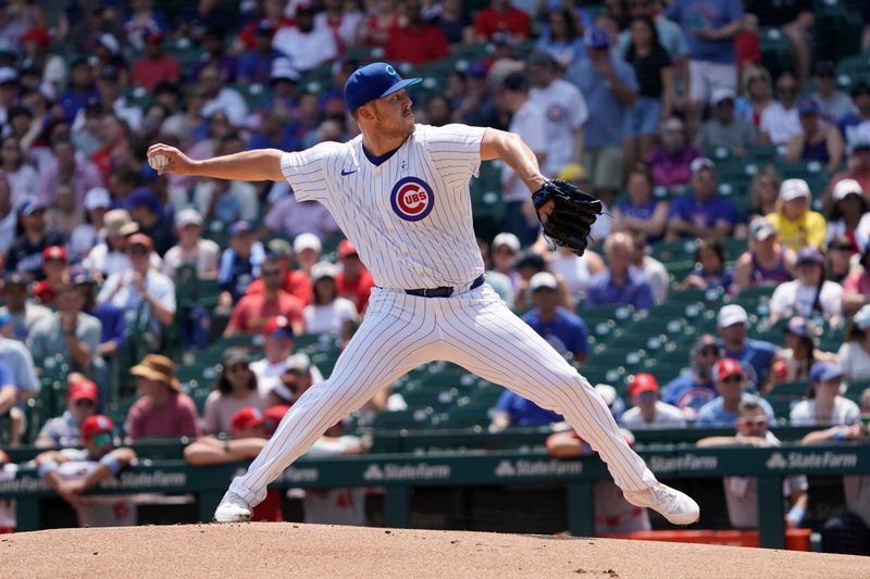 Jun 16, 2024; Chicago, Illinois, USA; Chicago Cubs pitcher Jameson Taillon (50) throws the ball against the St. Louis Cardinals during the first inning at Wrigley Field. Mandatory Credit: David Banks-USA TODAY Sports