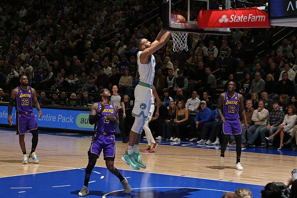 MINNEAPOLIS, MN -  DECEMBER 30: Rudy Gobert #27 of the Minnesota Timberwolves dunks the ball during the game against the Los Angeles Lakers on December 30, 2023 at Target Center in Minneapolis, Minnesota. NOTE TO USER: User expressly acknowledges and agrees that, by downloading and or using this Photograph, user is consenting to the terms and conditions of the Getty Images License Agreement. Mandatory Copyright Notice: Copyright 2023 NBAE (Photo by David Sherman/NBAE via Getty Images)