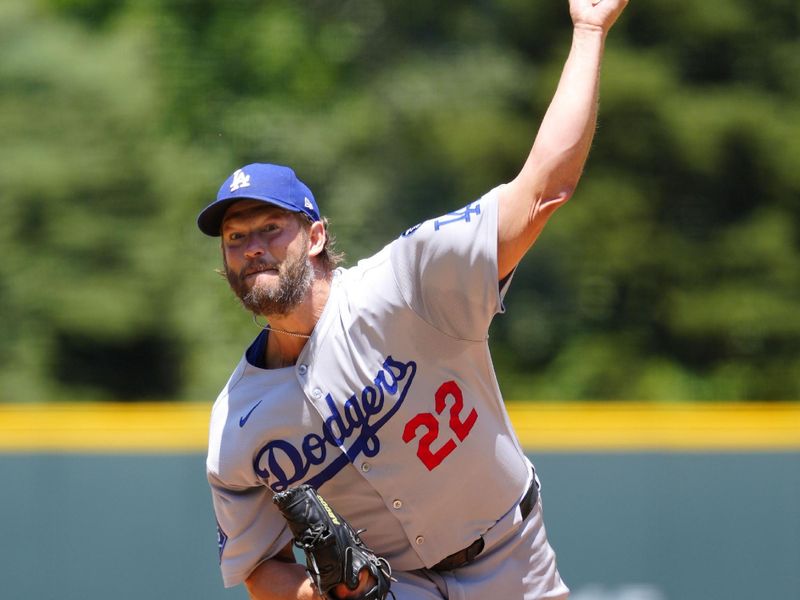 Jun 26, 2025; Denver, Colorado, USA; Los Angeles Dodgers starting pitcher Clayton Kershaw (22) delivers a pitch in the first inning against the Colorado Rockies at Coors Field. Mandatory Credit: Ron Chenoy-Imagn Images