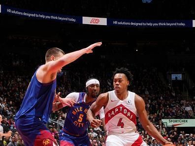 TORONTO, CANADA - DECEMBER 20:  Scottie Barnes #4 of the Toronto Raptors goes to the basket during the game on December 20, 2023 at the Scotiabank Arena in Toronto, Ontario, Canada.  NOTE TO USER: User expressly acknowledges and agrees that, by downloading and or using this Photograph, user is consenting to the terms and conditions of the Getty Images License Agreement.  Mandatory Copyright Notice: Copyright 2023 NBAE (Photo by Mark Blinch/NBAE via Getty Images)