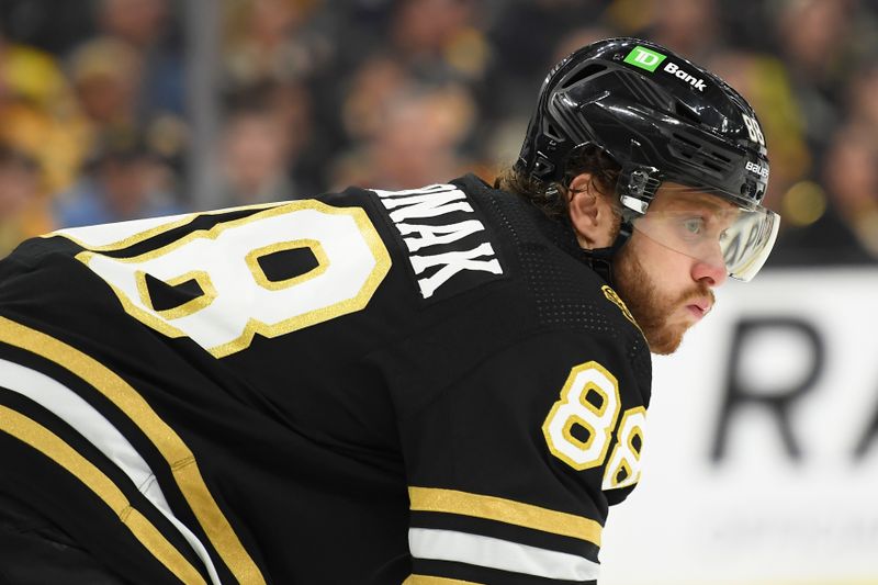 Jan 18, 2024; Boston, Massachusetts, USA; Boston Bruins right wing David Pastrnak (88) gets set for a face-off during the second period against the Colorado Avalanche at TD Garden. Mandatory Credit: Bob DeChiara-USA TODAY Sports