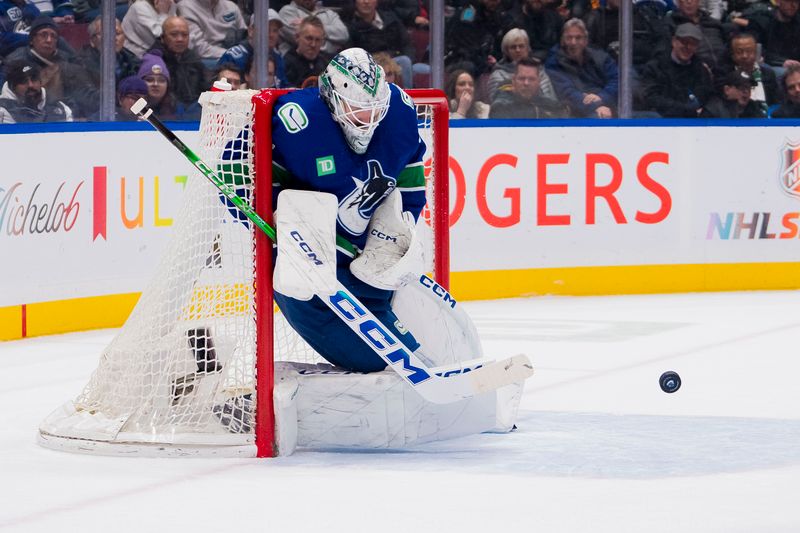 Jan 18, 2024; Vancouver, British Columbia, CAN; Vancouver Canucks goalie Thatcher Demko (35) makes a save against the Arizona Coyotes in the second period at Rogers Arena. Mandatory Credit: Bob Frid-USA TODAY Sports