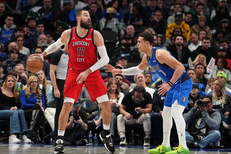 DALLAS, TX - JANUARY 13: Jonas Valanciunas #17 of the New Orleans Pelicans handles the ball during the game against the Dallas Mavericks on January 13, 2024 at the American Airlines Center in Dallas, Texas. NOTE TO USER: User expressly acknowledges and agrees that, by downloading and or using this photograph, User is consenting to the terms and conditions of the Getty Images License Agreement. Mandatory Copyright Notice: Copyright 2024 NBAE (Photo by Glenn James/NBAE via Getty Images)