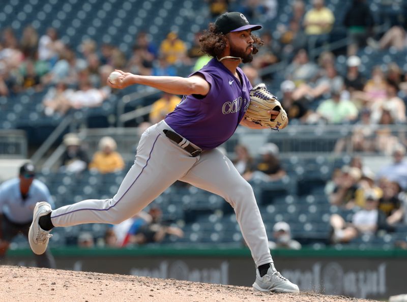 May 10, 2023; Pittsburgh, Pennsylvania, USA;  Colorado Rockies relief pitcher Justin Lawrence (61) pitches against the Pittsburgh Pirates during the eighth inning at PNC Park. Colorado won 4-3. Mandatory Credit: Charles LeClaire-USA TODAY Sports