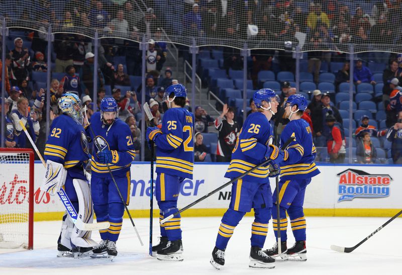 Nov 17, 2025; Buffalo, New York, USA;  The Buffalo Sabres celebrate a win over the Edmonton Oilers at KeyBank Center. Mandatory Credit: Timothy T. Ludwig-Imagn Images