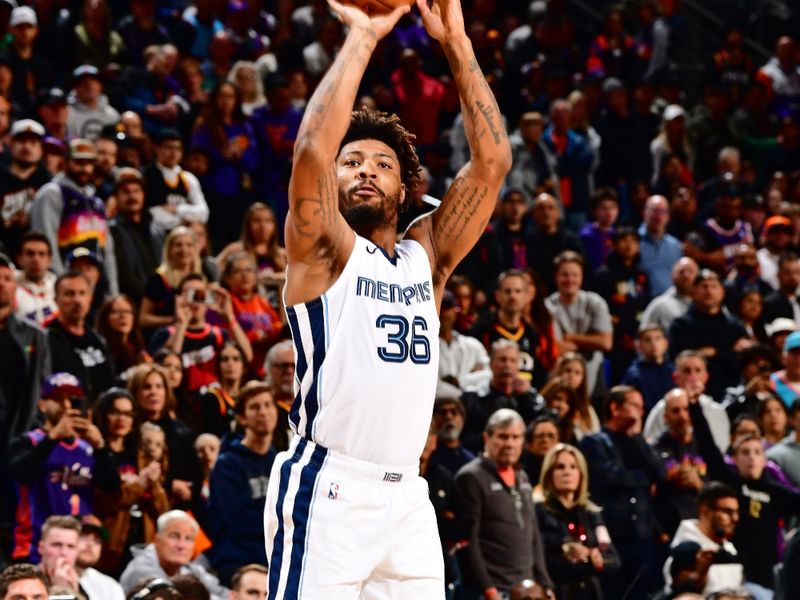 PHOENIX, AZ - JANUARY 7: Marcus Smart #36 of the Memphis Grizzlies shoots the ball during the game against the Phoenix Suns on January 7, 2024 at Footprint Center in Phoenix, Arizona. NOTE TO USER: User expressly acknowledges and agrees that, by downloading and or using this photograph, user is consenting to the terms and conditions of the Getty Images License Agreement. Mandatory Copyright Notice: Copyright 2024 NBAE (Photo by Barry Gossage/NBAE via Getty Images)